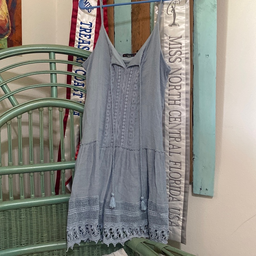 Fits like a medium, barely worn, lace bottom, a baby blue color.